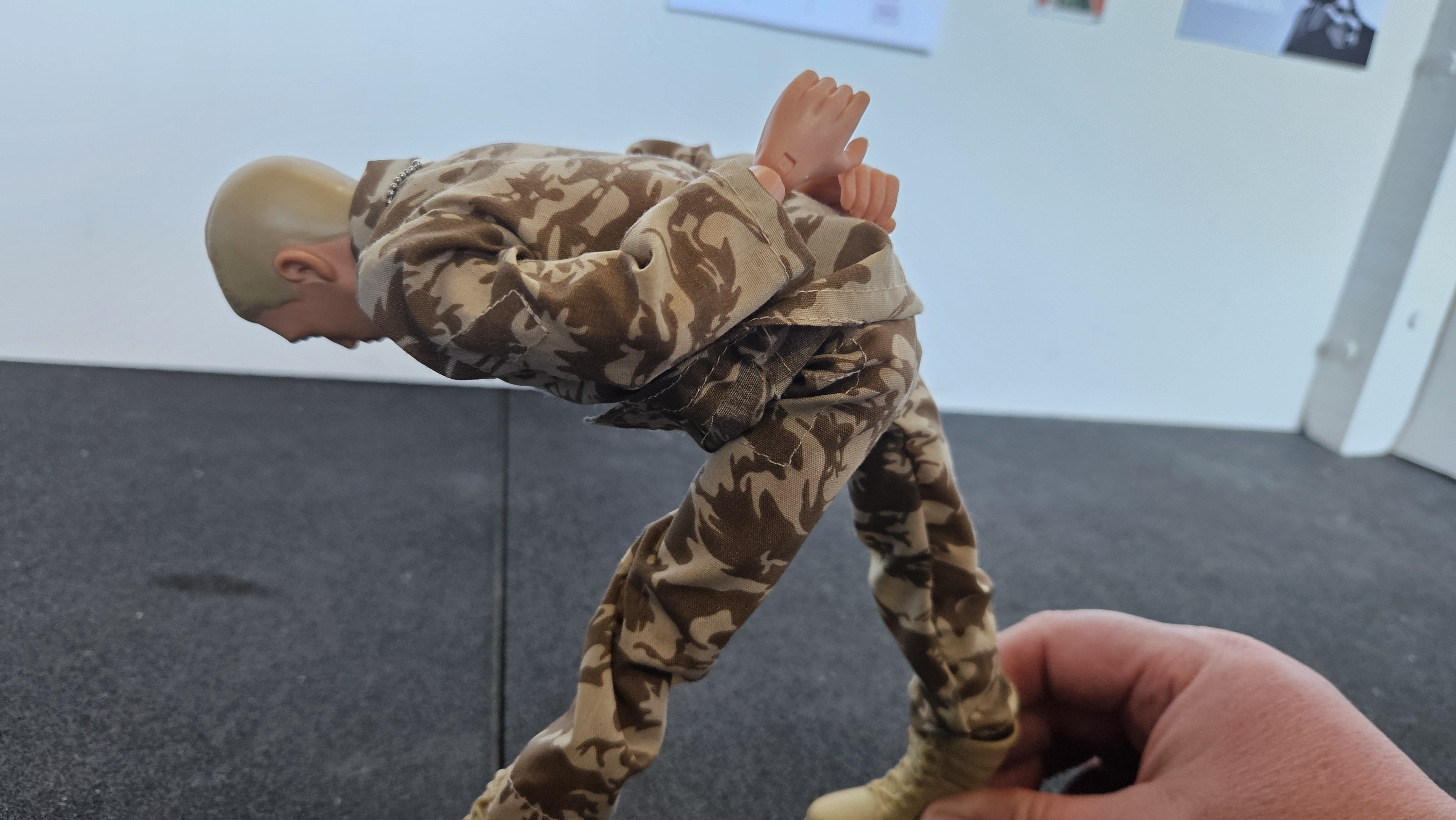 Action Man doing Intense Side Stretch Pose